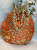 Load image into Gallery viewer, orange ladies potli bags - Affinity Giya
