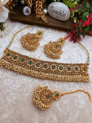 Mansi loads off pearlsChoker set temple jewelry