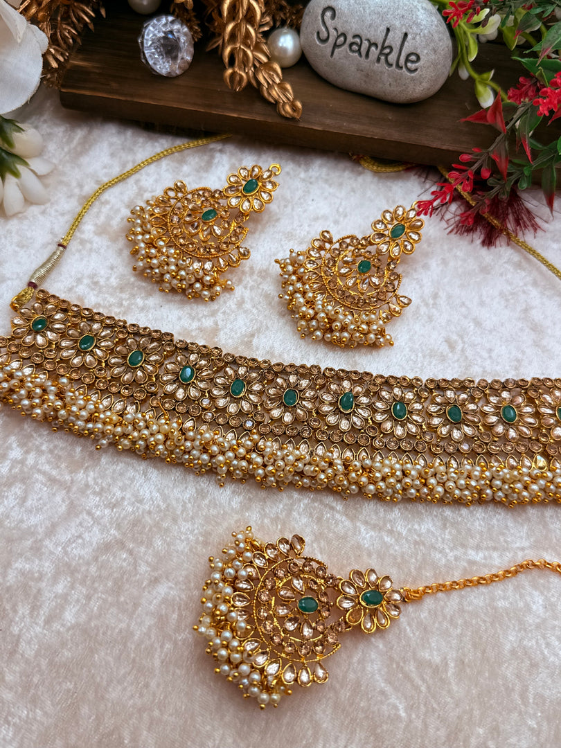 Mansi loads off pearlsChoker set temple jewelry