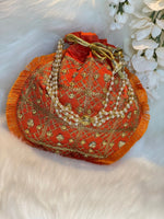 Load image into Gallery viewer, orange ladies potli bags  - Affinity Giya